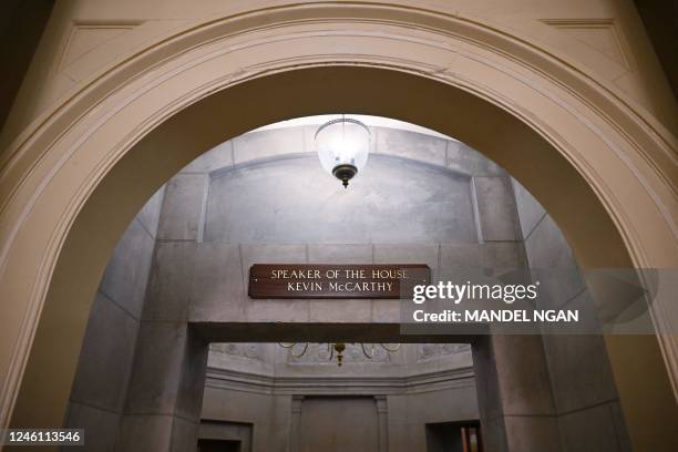 Sign with the name of newly-elected House Speaker Kevin McCarthy is seen outside his suite of offices in the US Capitol in Washington, DC on January...