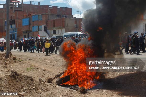 Hundreds of supporters of ousted president Pedro Castillo march into the city of Puno, in southern Peru, on January 9, 2023. - Political upheaval has...