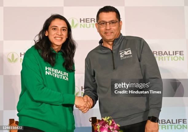 Indian women cricket team vice-captain Smriti Mandhana with Ajay Khanna, SVP & MD, Herbalife Nutrition India, promoting Herbalife Nutrition, as the...