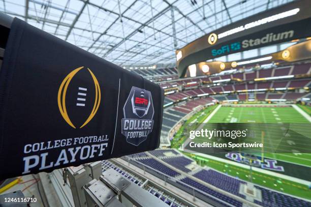Detail view of the CFP and ESPN logo is seen on a broadcast tv camera prior to game action during the 2023 CFP National Championship game between the...