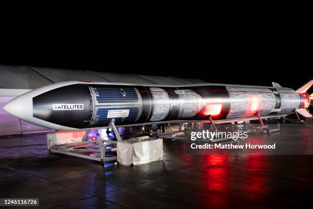 Model of the LauncherOne rocket as Cosmic Girl, a Boeing 747-400 aircraft, prepares to take off at Cornwall Airport Newquay on January 9, 2023 in...