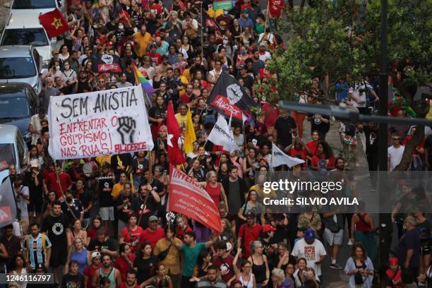 Members of social movements protest in defense of democracy in Porto Alegre, in southern Brazil, on January 9 a day after supporters of Brazil's...