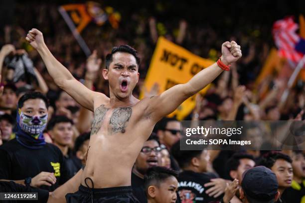 Malaysia fans cheer during the AFF Mitsubishi Electric Cup 2022 match between Malaysia and Thailand at the Bukit Jalil National Stadium. Final score;...