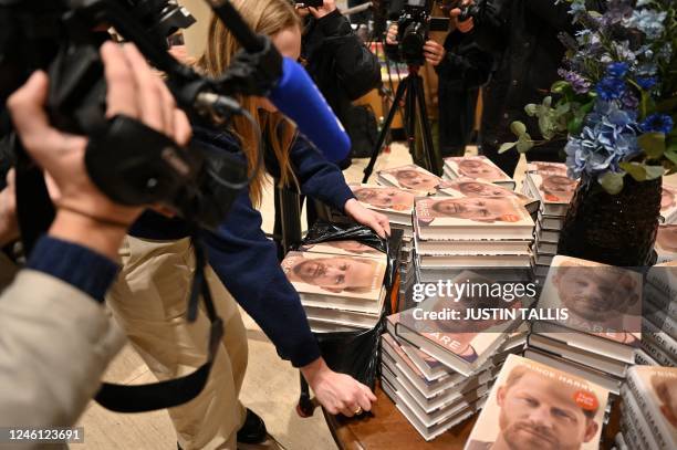 Bookseller unpacks copies of "Spare" by Britain's Prince Harry, Duke of Sussex, at Waterstones' flagship Piccadilly bookshop on the day of its...