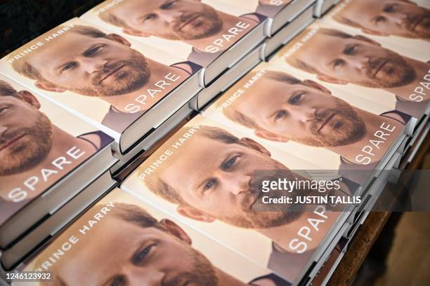 Copies of "Spare" by Britain's Prince Harry, Duke of Sussex, are displayed at Daunt Books on Marylebone High Street in London on January 10, 2023. -...