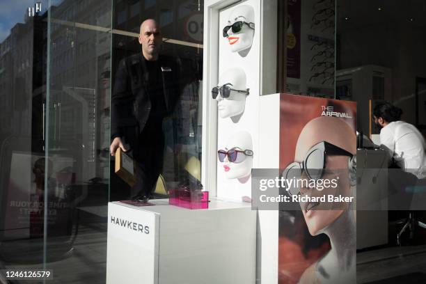 Display of glasses in the window of a Vision Express optician business in the City of London, the capital's financial district, on 9th January 2023,...