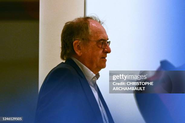 French Football Federation President Noel Le Graet walks at the FFF headquarters after attending a hearing as part of a government audit of the...