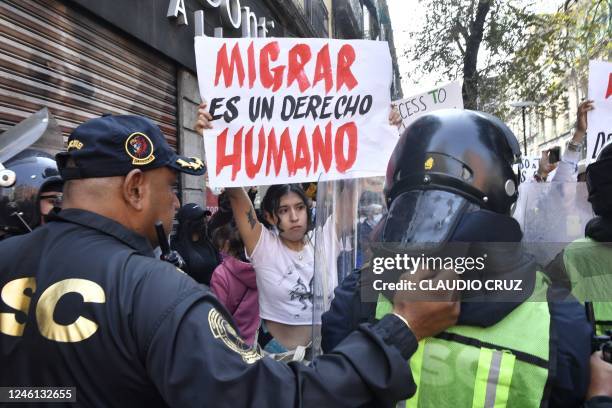 Demonstrators protest against mass deportations at the US-Mexico border, in the surroundings of the National Palace in Mexico City on January 10,...