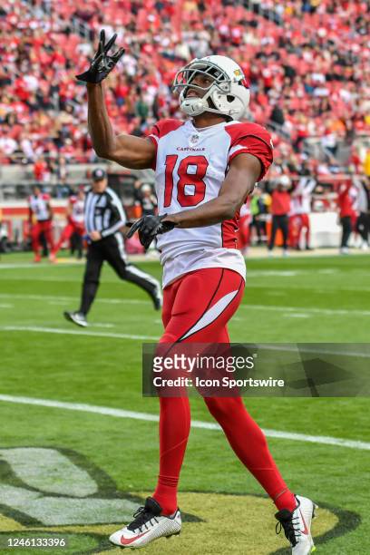 Arizona Cardinals wide receiver A.J. Green flicks the ball into the endzone after an opening drive touchdown in the Week 18 game between the Arizona...
