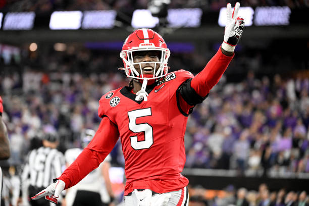 Kelee Ringo of the Georgia Bulldogs celebrates an interception against the TCU Horned Frogs during the first half of the CFP National Championship