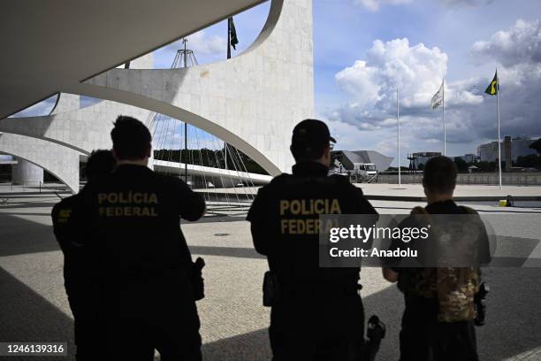 Members of the Federal Police work at the Presidency of the Republic building after protests by supporters of former President Jair Bolsonaro against...