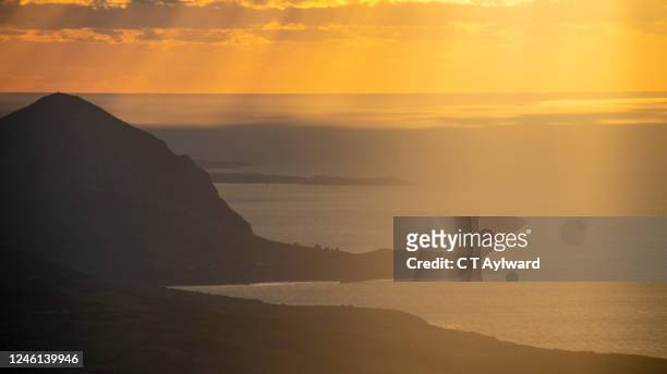 sunset over the llyn peninsula north wales - tremadog bay stock pictures, royalty-free photos & images