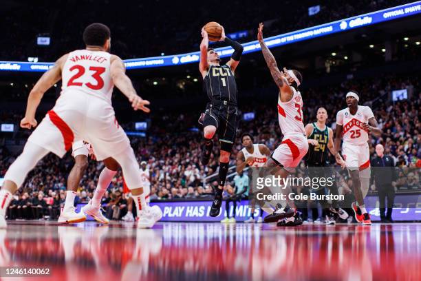 LaMelo Ball of the Charlotte Hornets drives to the net against Gary Trent Jr. #33 of the Toronto Raptors during the first half of their NBA game at...