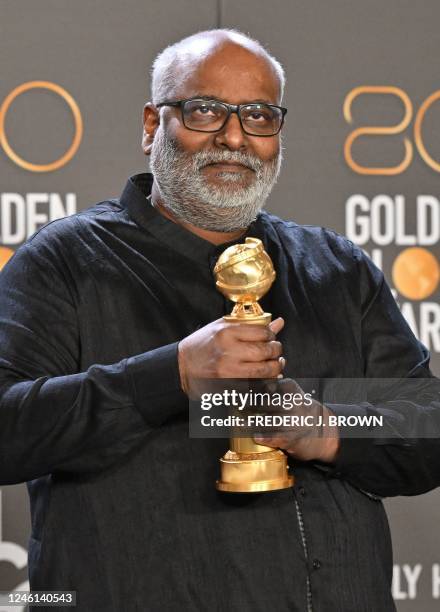 Indian film composer M. M. Keeravani poses with the award for Best Song - Motion Picture for "Naatu Naatu" from "RRR" in the press room during the...