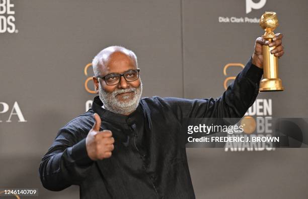Indian film composer M. M. Keeravani poses with the award for Best Song - Motion Picture for "Naatu Naatu" from "RRR" in the press room during the...