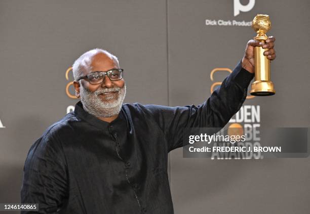 Indian film composer M. M. Keeravani poses with the award for Best Song - Motion Picture for "Naatu Naatu" from "RRR" in the press room during the...