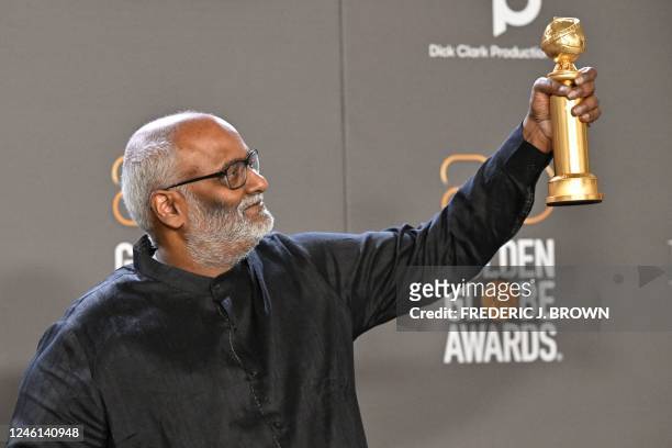 Indian film composer M. M. Keeravani poses with the award for Best Song - Motion Picture for "Naatu Naatu" from "RRR" in the press room during the...