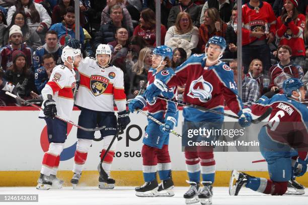 Sam Bennett and Sam Reinhart of the Florida Panthers celebrate a goal against the Colorado Avalanche at Ball Arena on January 10, 2023 in Denver,...