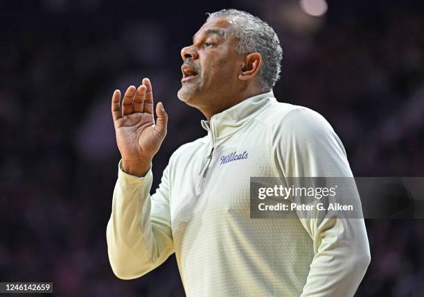 Head coach Jerome Tang of the Kansas State Wildcats directs the team in the first half against the Oklahoma State Cowboys at Bramlage Coliseum on...