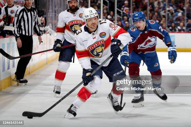 Sam Reinhart of the Florida Panthers looks to pass in the second period against the Colorado Avalanche at Ball Arena on January 10, 2023 in Denver,...