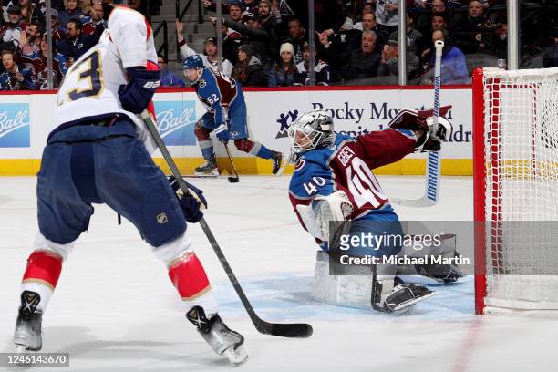 Goaltender Alexandar Georgiev of the Colorado Avalanche stretches to defend against Carter Verhaeghe of the Florida Panthers at Ball Arena on January...