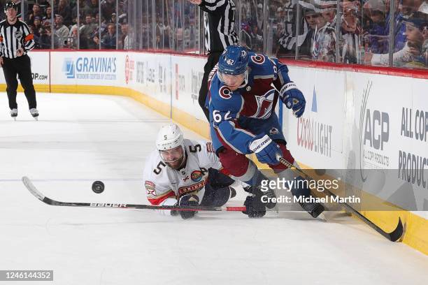 Artturi Lehkonen of the Colorado Avalanche skates against Aaron Ekblad of the Florida Panthers at Ball Arena on January 10, 2023 in Denver, Colorado....