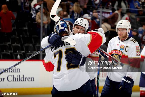 Goaltender Sergei Bobrovsky and Matthew Tkachuk of the Florida Panthers celebrate a victory against the Colorado Avalanche at Ball Arena on January...