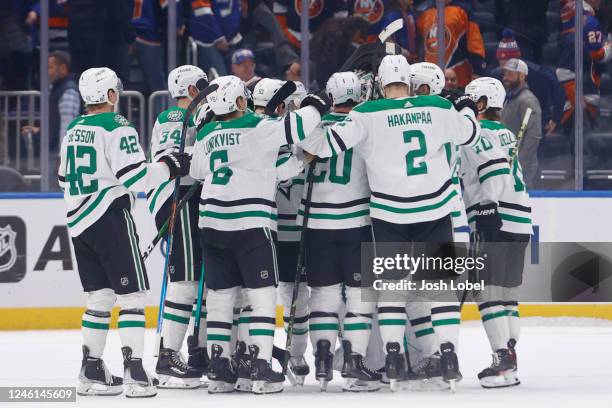 The Dallas Stars celebrate after defeating the New York Islanders 2-1 in a shootout at UBS Arena on January 10, 2023 in Elmont, New York.
