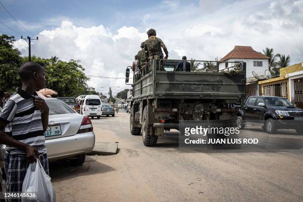 Military truck drives along the market area of the Natite neighbourhood in Pemba on January 7, 2023.