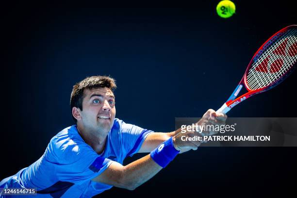 Chilean Tomas Barrios Vera pictured in action during a tennis match against Belgian Bergs, the first round of the men's qualifications for the...