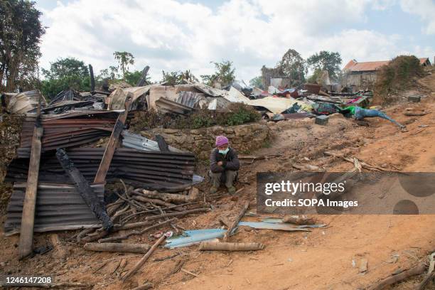 An old man sitting in front of a house that was burned by the army's air strike. Six days of fighting between the security and the Ta'ang National...