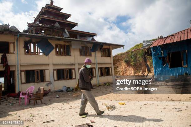 An old man is walking in a monastery damaged by the army's air strike in Konethar village in Namhsan Township, northern Shan State. Six days of...