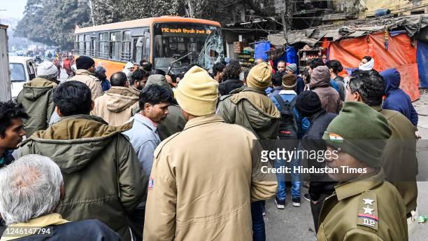 Local residents along with Police personnel gathered, after a Transit bus rammed into the pavement and injured many people at Rohtak Road, near Sarai...