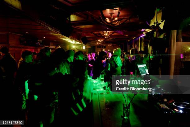 Customers at a bar in Ischgl, Austria, on Tuesday, Jan. 10, 2023. Its been an unseasonably warm winter in Europe and ski resorts in the Alps are...