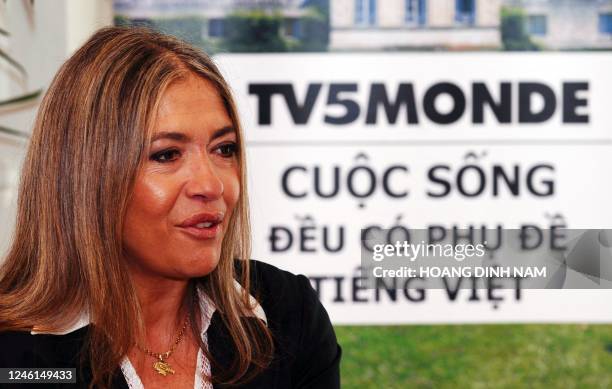Marie-Christine Saragosse, CEO of France's TV5 Monde, addresses a press conference on the launching of the channel subtitled in Vietnamese in Hanoi...