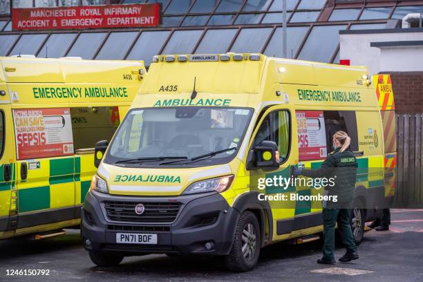 Paramedic enters an ambulance outside the Accident and Emergency department at Manchester Royal Infirmary during strike action by ambulance workers...