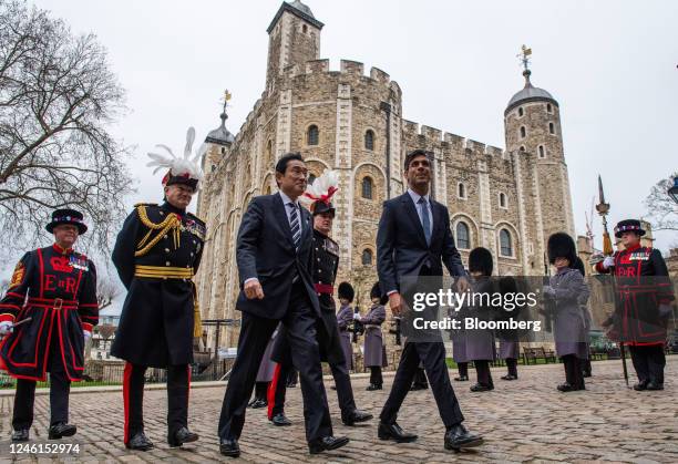 Rishi Sunak, UK prime minister, and Fumio Kishida, Japan's prime minister, pass a guard of honour ahead of their bilateral meeting at the Tower of...