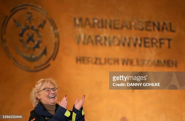 German Defence Minister Christine Lambrecht reacts during the official inauguration of the German navy arsenal 'Warnowwerft' in Rostock-Warnemuende,...