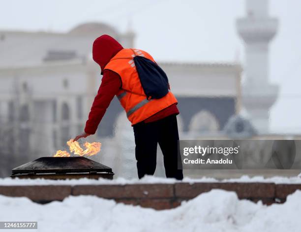 Kyrgyz people during a second day of snowfall in Bishkek, Kyrgyzstan on January 11, 2023. The temperature in Bishkek dropped to -14 degrees Celsius...