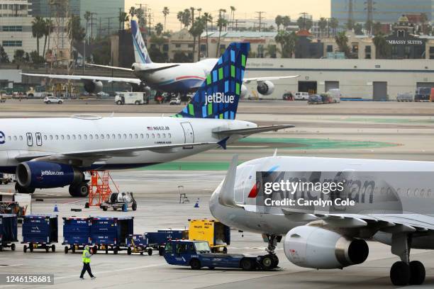 Los Angeles, CaliforniaJan. 11, 2023Flights prepare to take off at LAX on Jan. 11, 2023 after an FAA computer problem. The Federal Aviation...