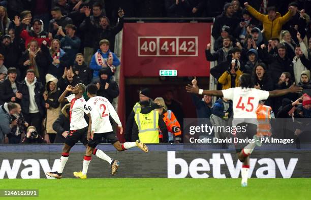 Southampton's Moussa Djenepo celebrates scoring their side's second goal of the game with team-mates Kyle Walker-Peters and Romeo Lavia during the...