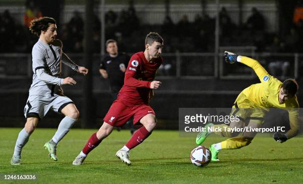 Mateusz Musialowski of Liverpool and Thomas Cordier and Lucas Lavallee of Paris Saint-Germain in action during the Premier League International Cup...