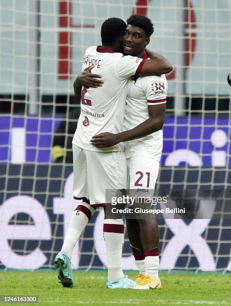 Michel Ndary Adopo of Torino FC 1906 celebrates with his teammate Brian Jephte Bayeye after scoring the opening goal during the Coppa Italia...