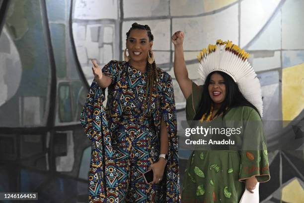 New Minister of Racial Equality Anielle Franco gestures near the new Minister of Indigenous Peoples Sonia Guajajara during an inauguration ceremony...