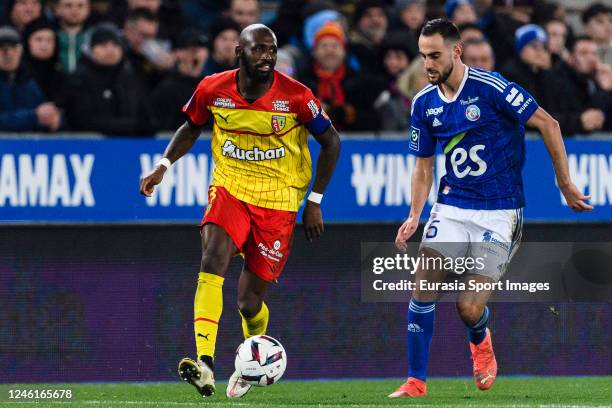 Lucas Perrin of RC Strasbourg chases Seko Fofana of Lens during the Ligue 1 match between RC Strasbourg and RC Lens at Stade de la Meinau on January...