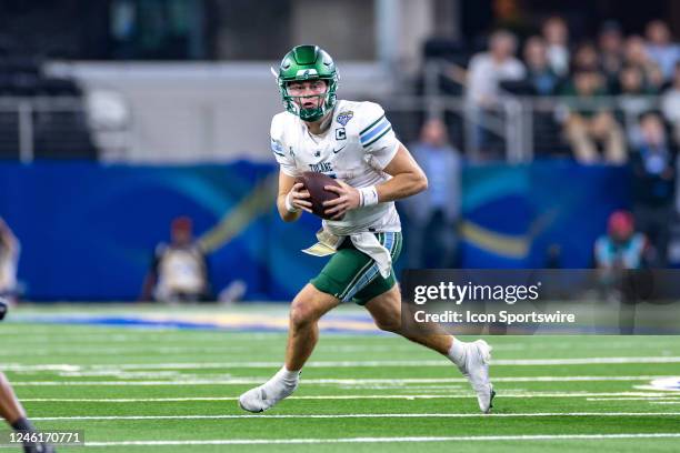 Tulane Green Wave quarterback Michael Pratt runs up field during the Goodyear Cotton Bowl game between the USC Trojans and Tulane Green Wave on...