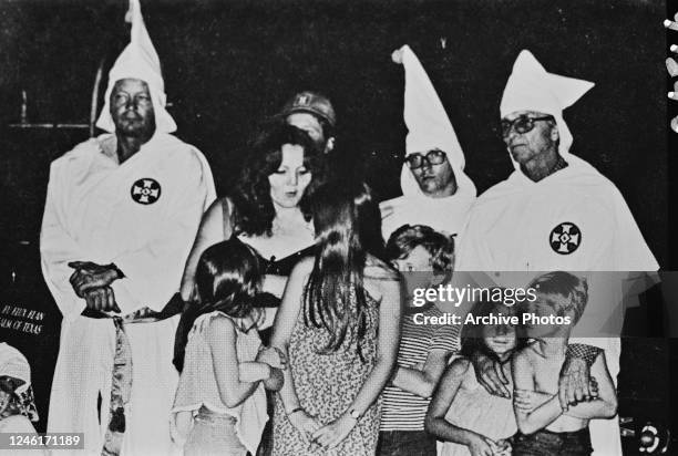 Men, women and children of the Ku Klux Klan, USA, circa 1960.