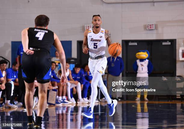 Cal State Bakersfield Roadrunners guard Naseem Gaskin dribbles the ball up the court during the game between the UC Santa Barbara and the Cal State...