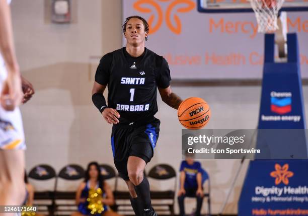 Santa Barbara Gauchos guard Josh Pierre-Louis dribbles the ball up the court during the game between the UC Santa Barbara and the Cal State...