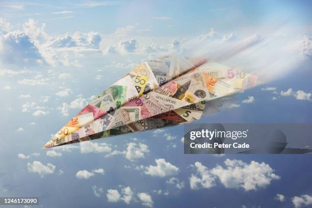 paper airplane made of money - 2018 money stock pictures, royalty-free photos & images